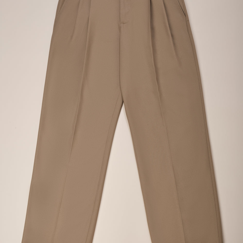 
                  
                    Le pantalon Revolver Beige
                  
                